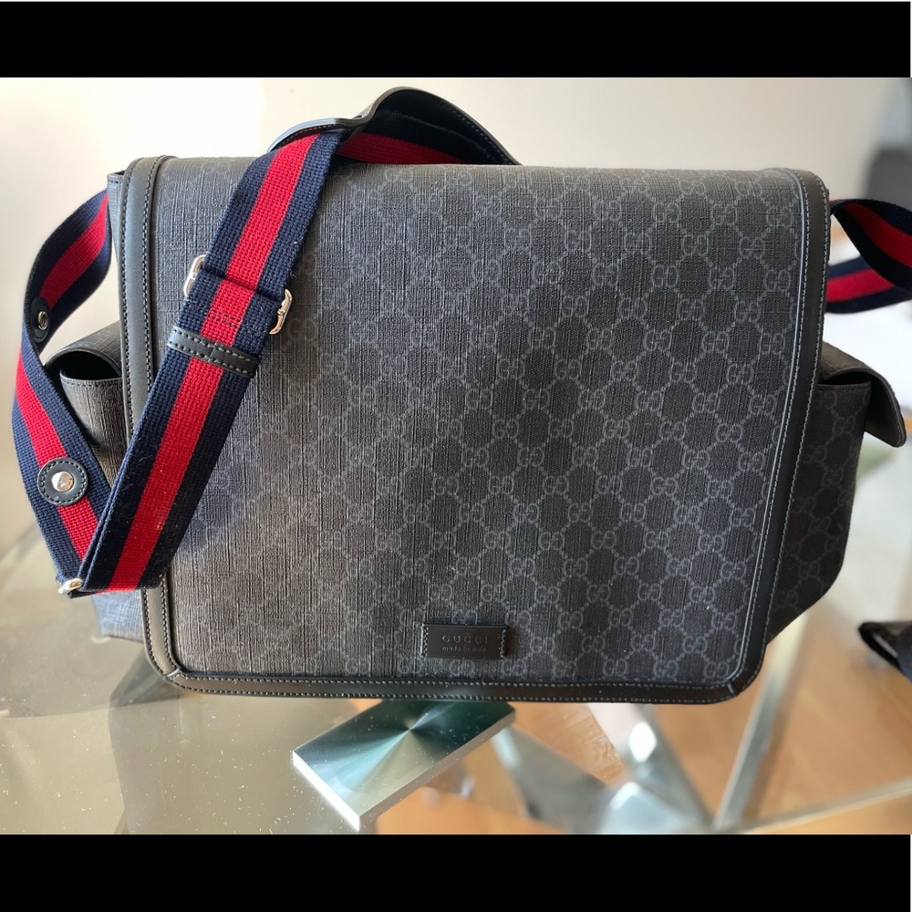 Gucci diaper bag with changing pad